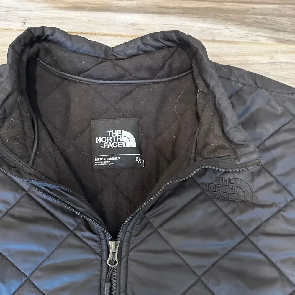 The North Face black quilted diamond pattern puffer jacket